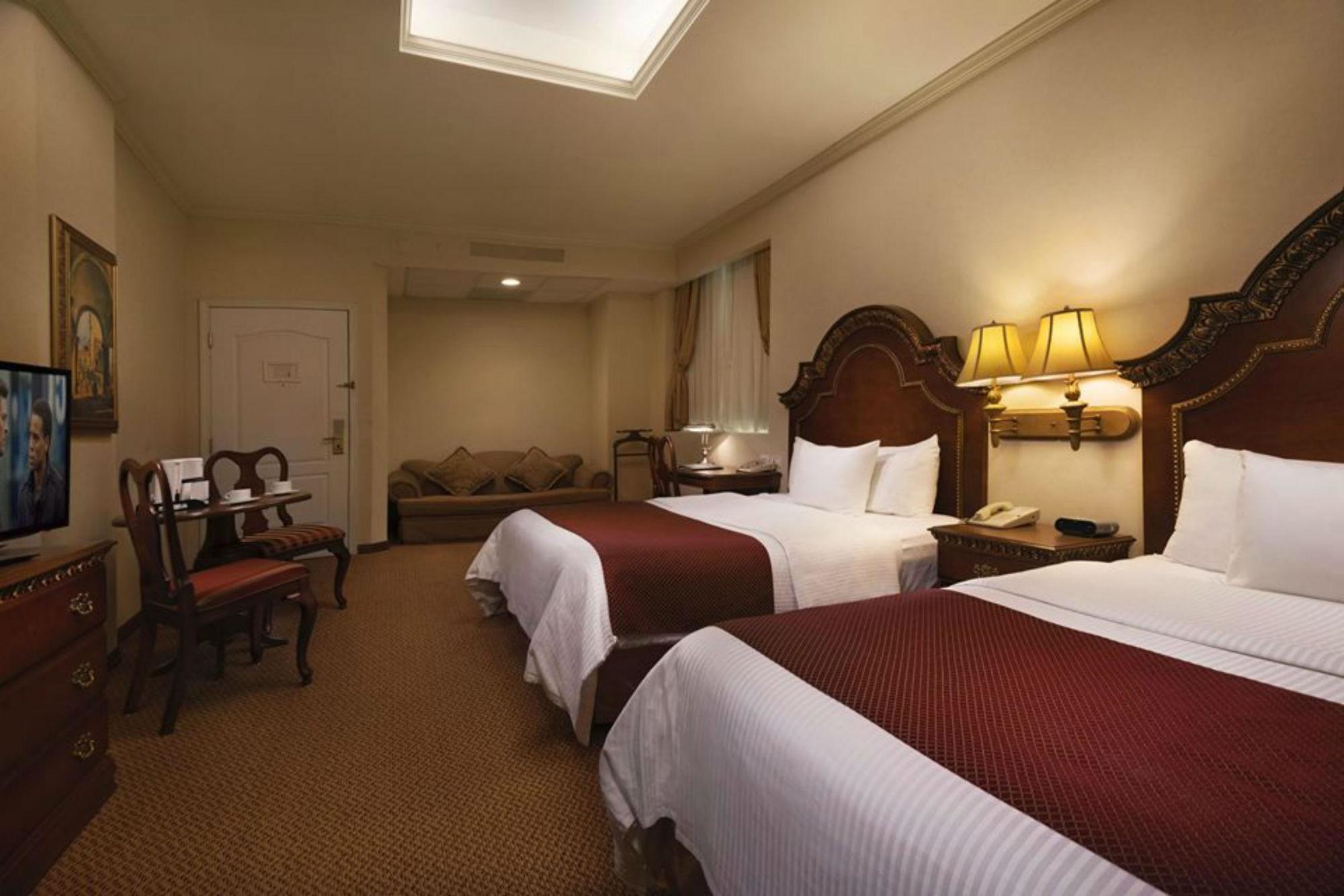 萨菲奢华皇谷酒店 San Pedro Garza Garcia 外观 照片 A room at the Inn at the Opera